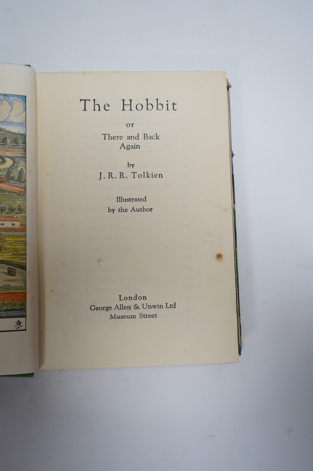 Tolkien J.R.R - The Hobbit, 2nd edition, 5th. impression, colour frontispiece, illustrations, map endpapers, top edge green, original green pictorial cloth, unclipped dust jacket, 8vo, George Allen & Unwin, London, 1951.